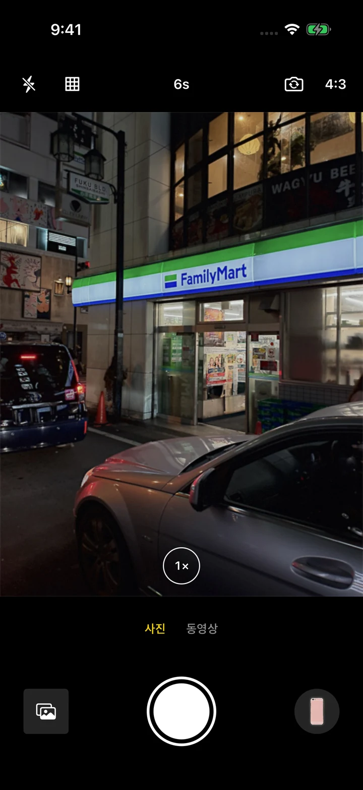 같은 밤거리 사진에 iY2K 6s 필터를 적용한 촬영 UI 캡처